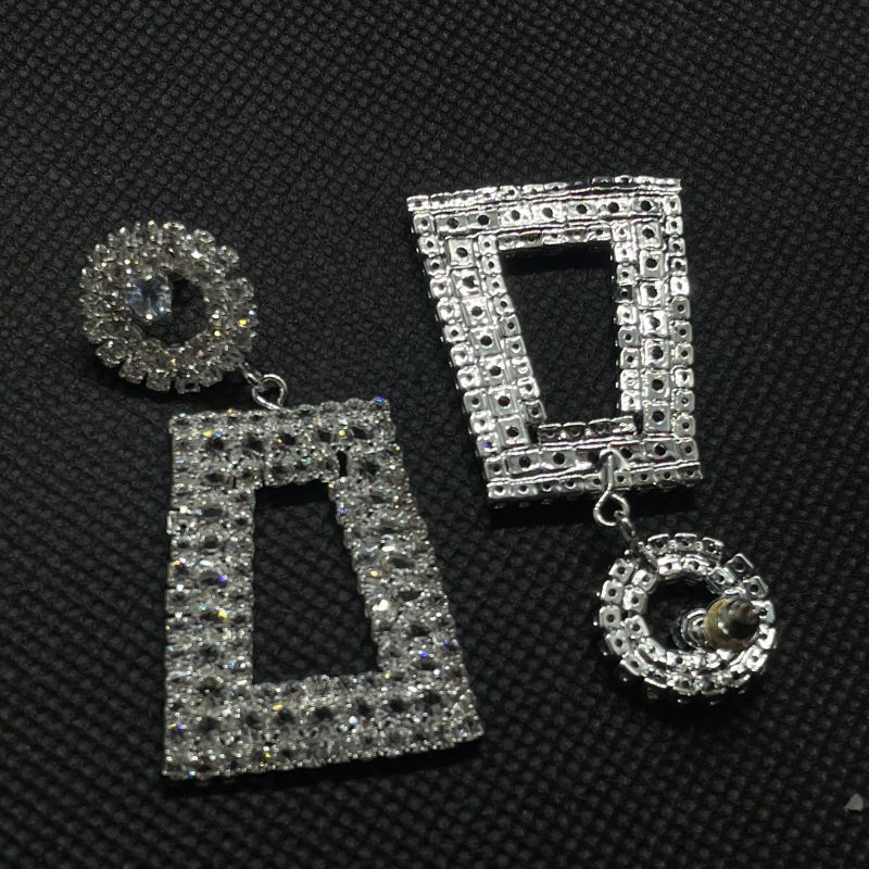 Silver Textured Rectangle Earrings - Image 2