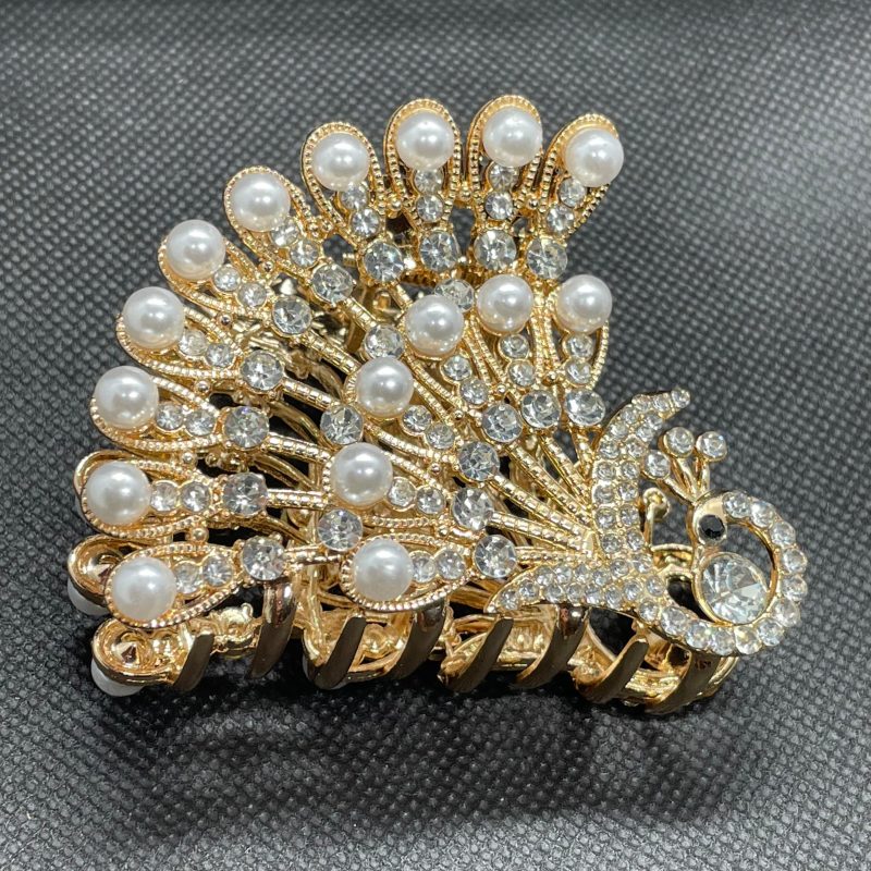 Peacock Pearl Catcher